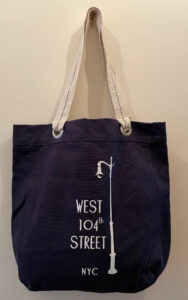 Large Navy blue canvas tote with white West 104th Street lamp post logo and natural cotton handles